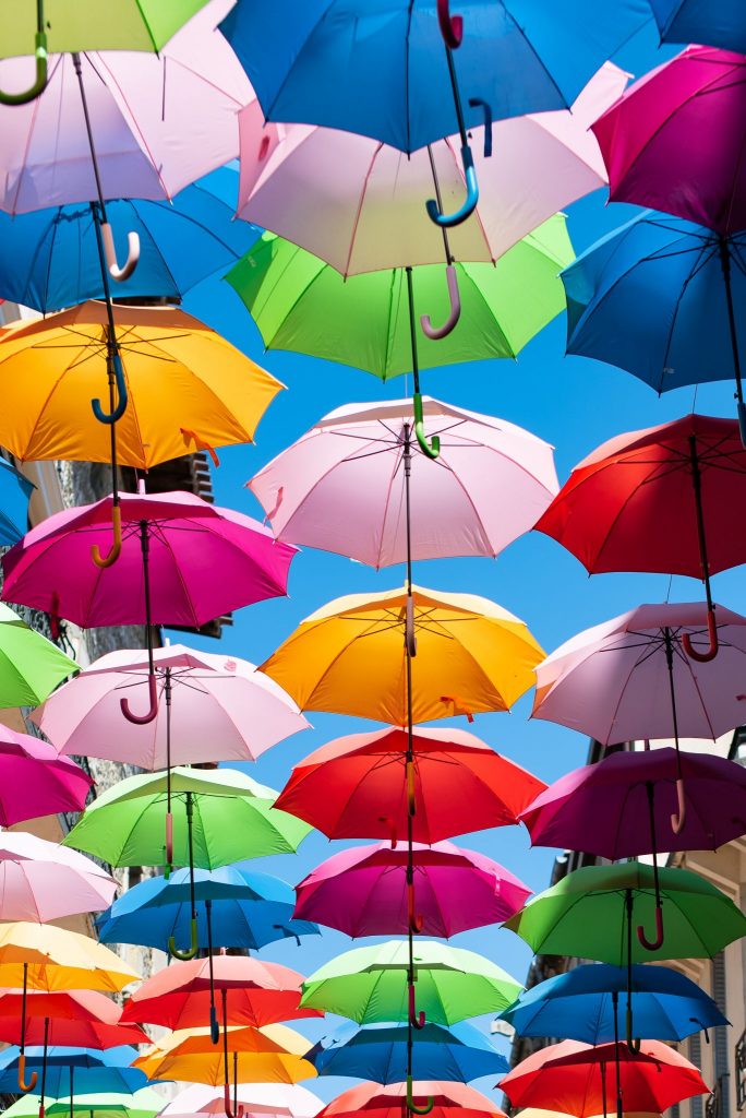 Canva - Low-angle Photo of Colorful Umbrella Street Art