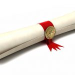 Royalty free 3d rendering of paper scroll with red ribbon and golden seal isolated on white.